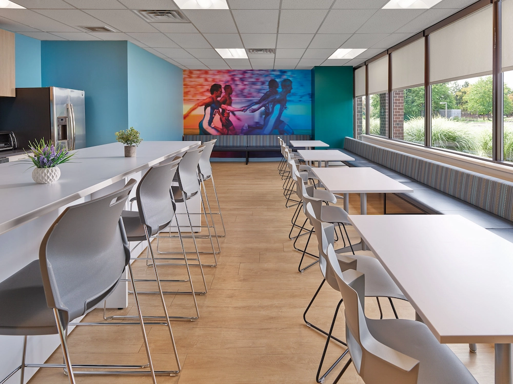 break area with natural light from large windows and lots of seating