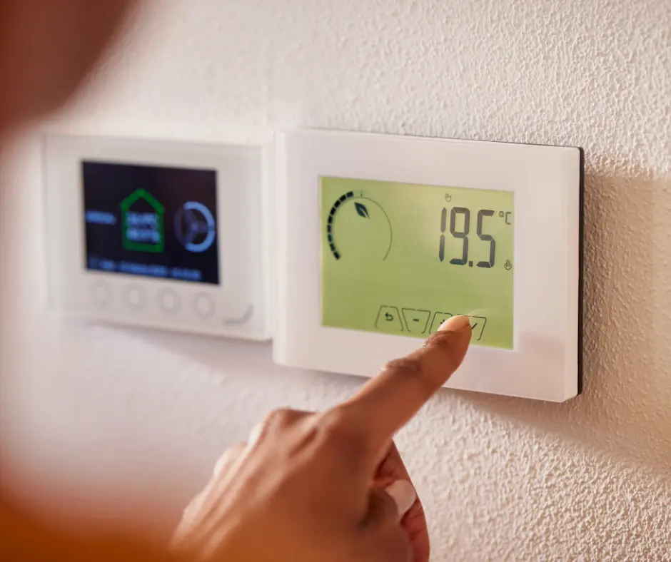 hand adjusting thermostat