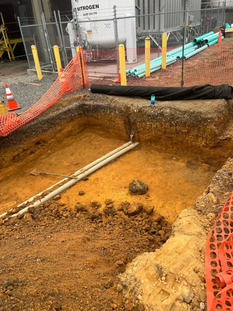 digging project with whole dug for drainage and drains installed