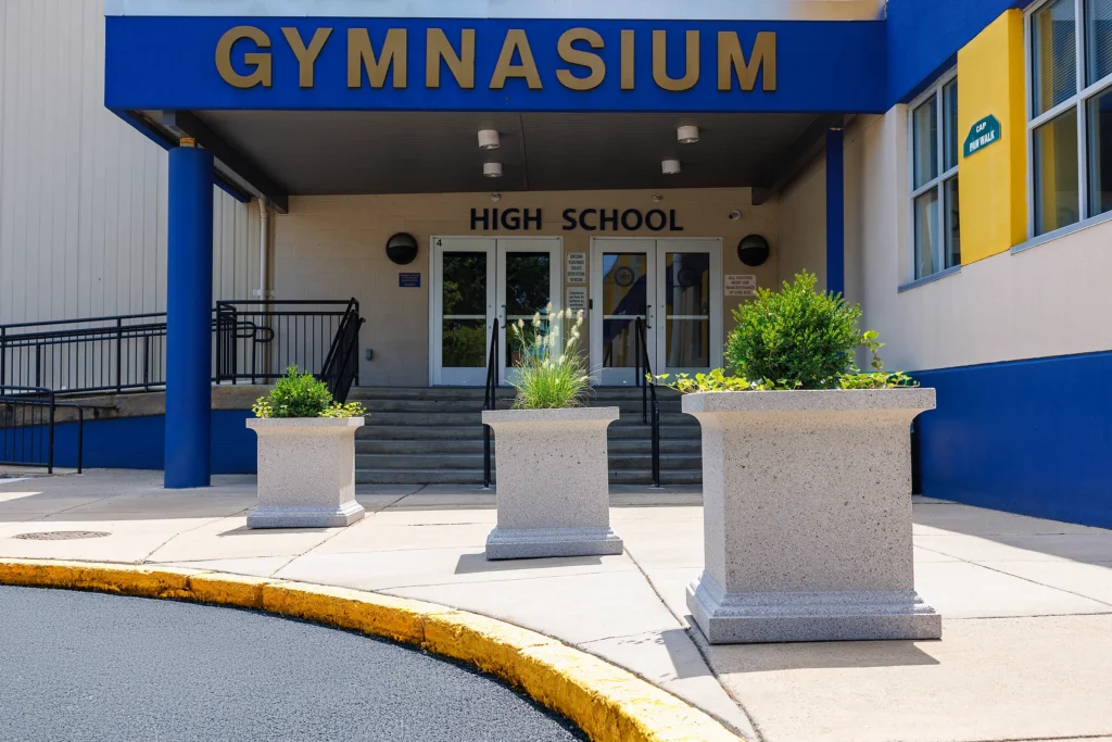 Planters enhance pedestrian safety at the Community Academy of Philadelphia high school entrance.