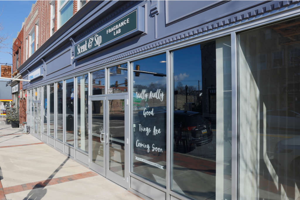 glass facade of retail stores on a beautiful street